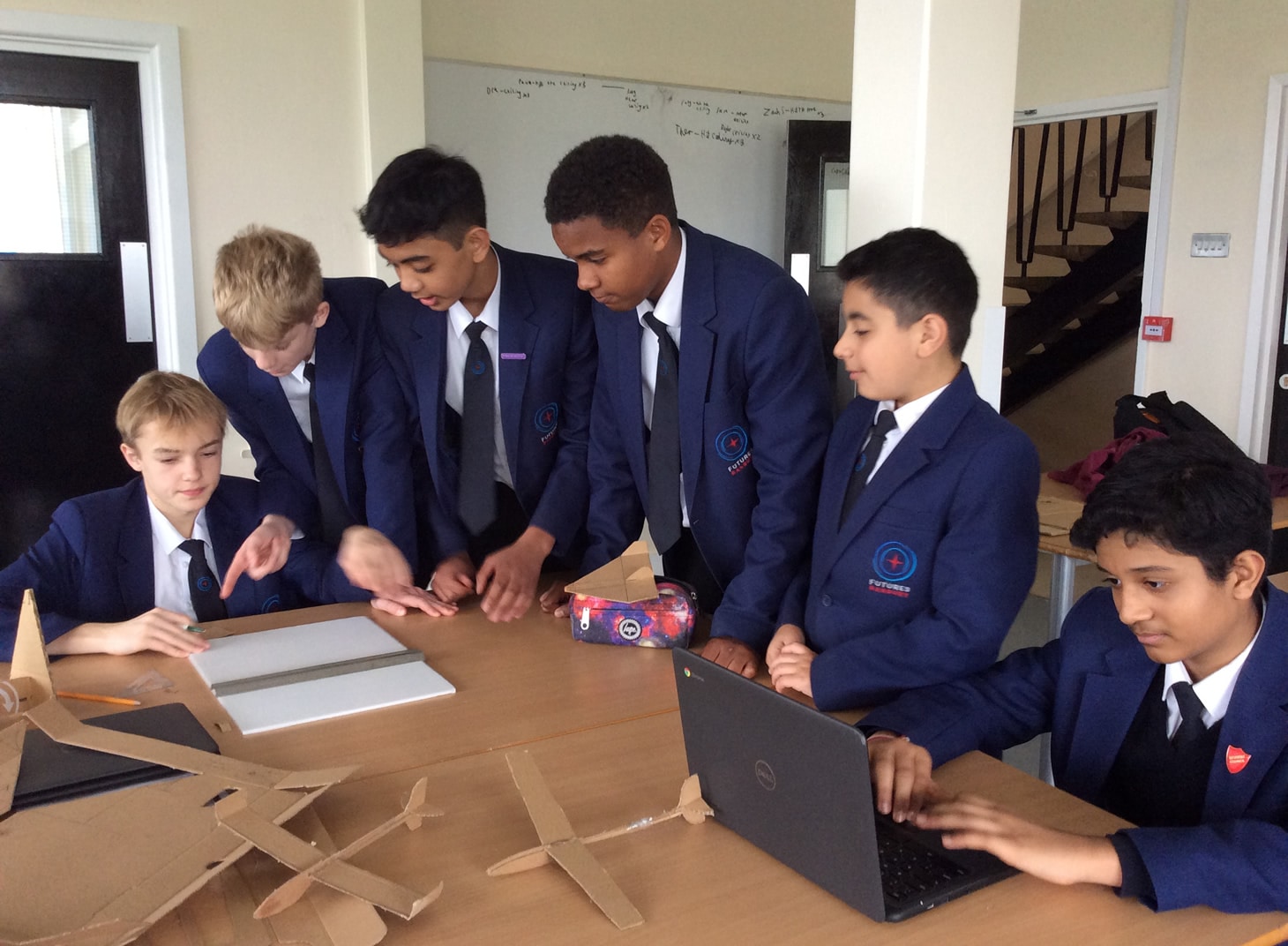 Year 9 students working on their designs